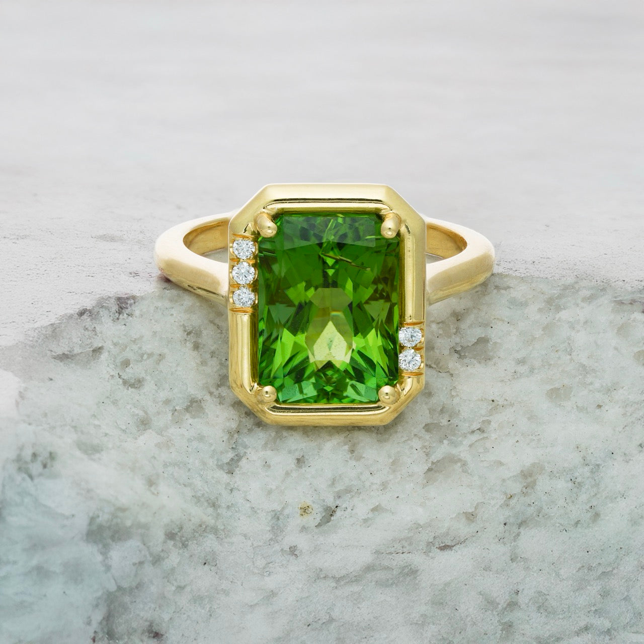 Yellow gold peridot ring with diamonds