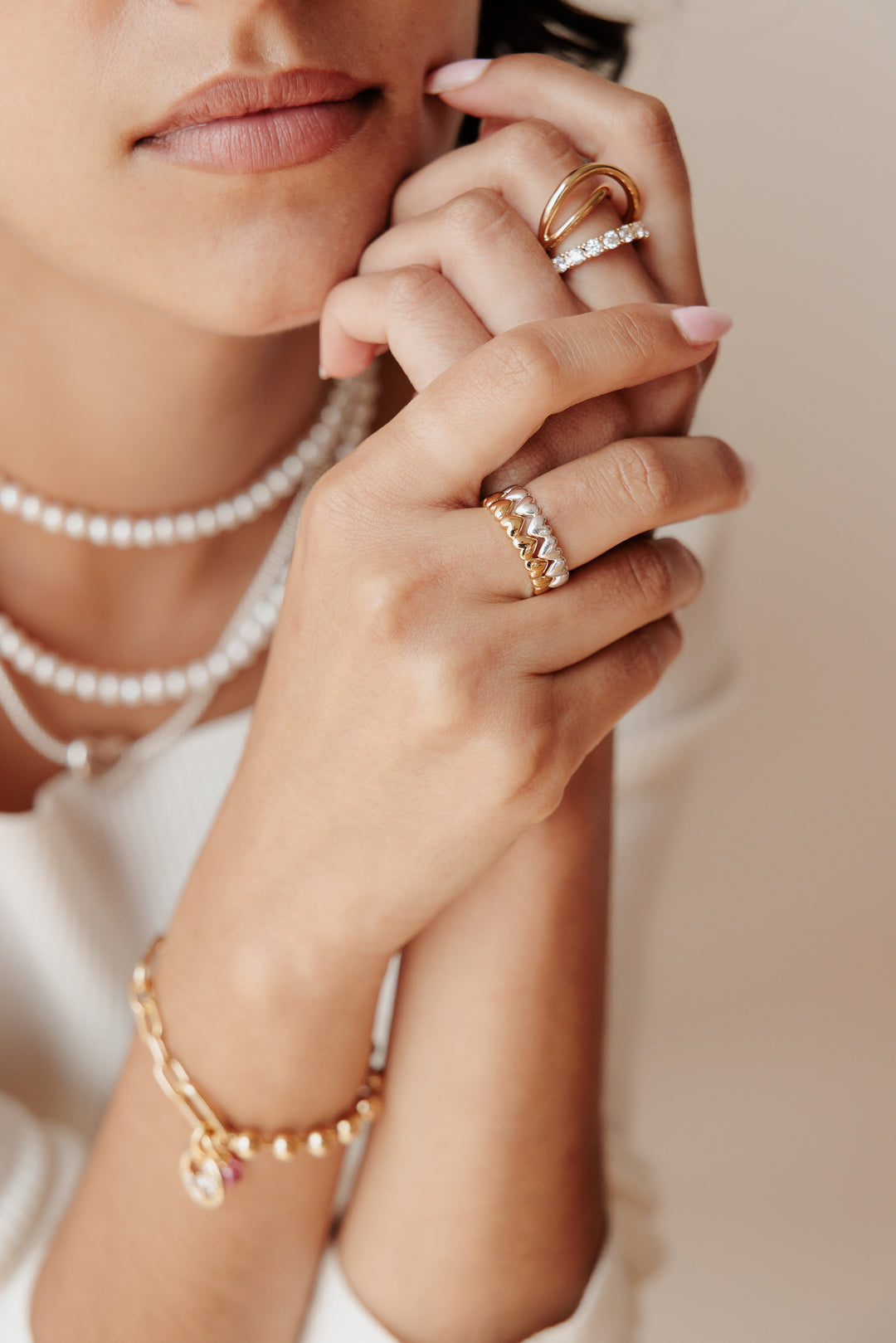pandora model wearing rings