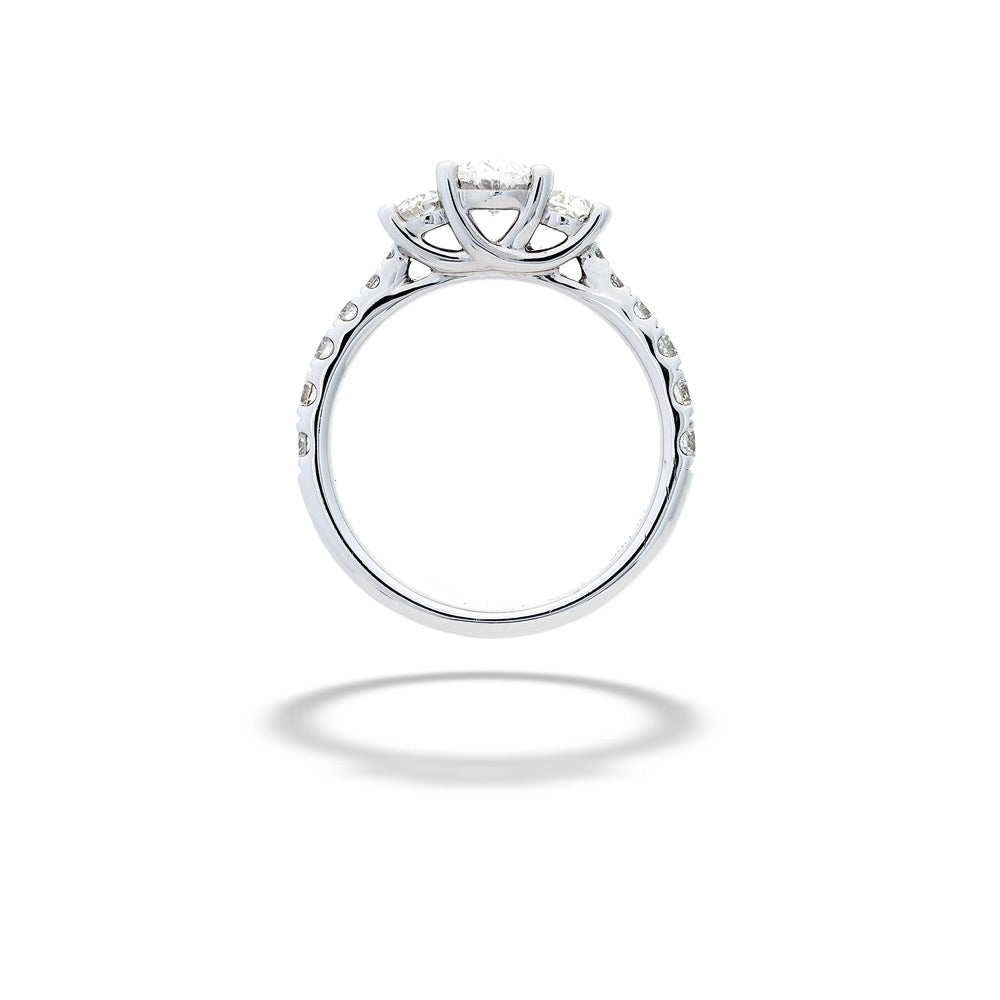 Silver ring with a diamond on a white background 3-Stone Diamond Engagement Ring