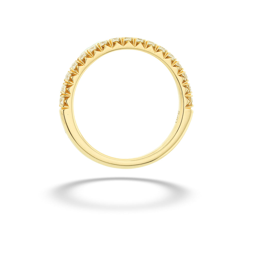 Gold ring with pyramid texture on a white background 14K Gold Diamond Band