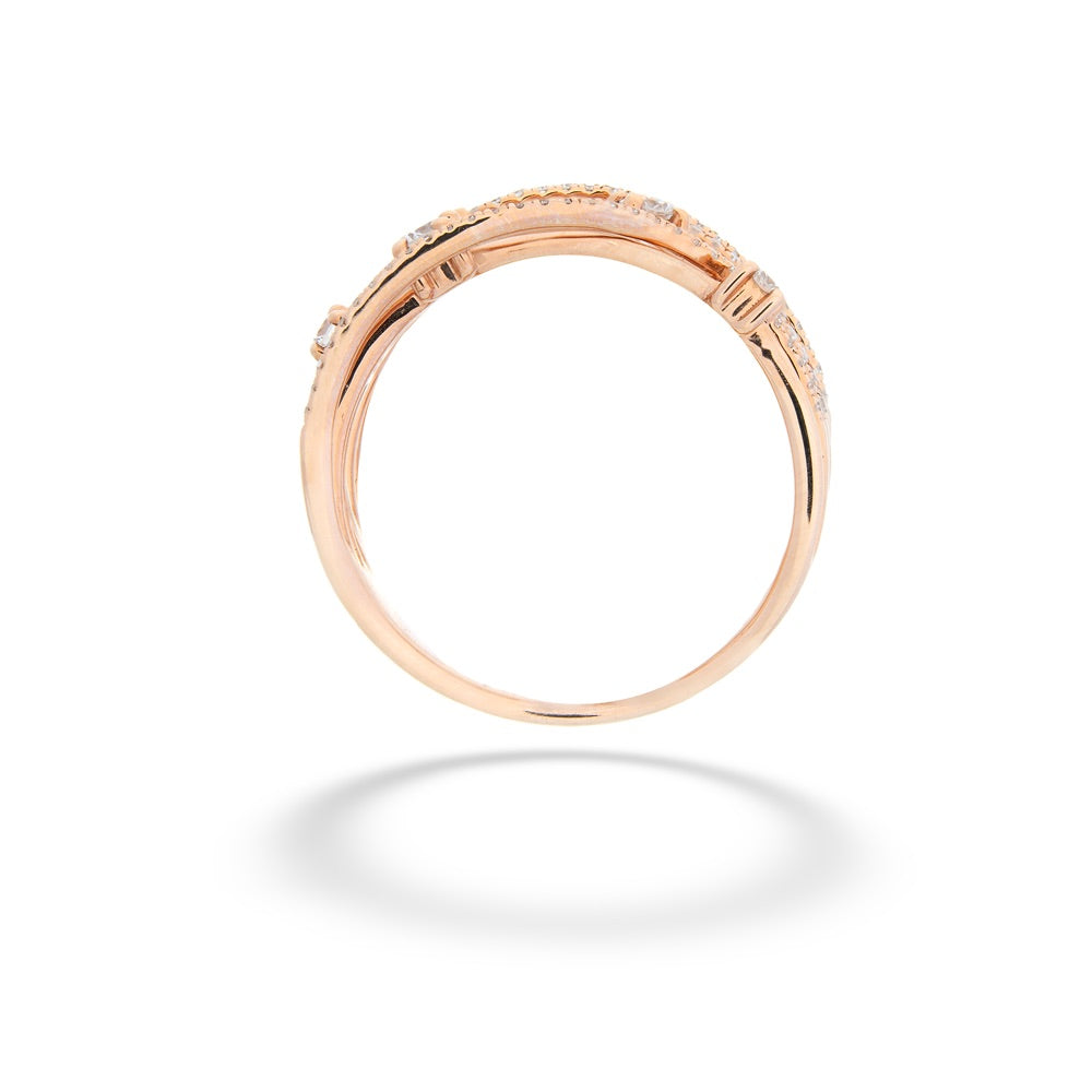 Rose gold ring with small diamonds on a white background Rose Gold Diamond Bridge Ring by Shy Creation