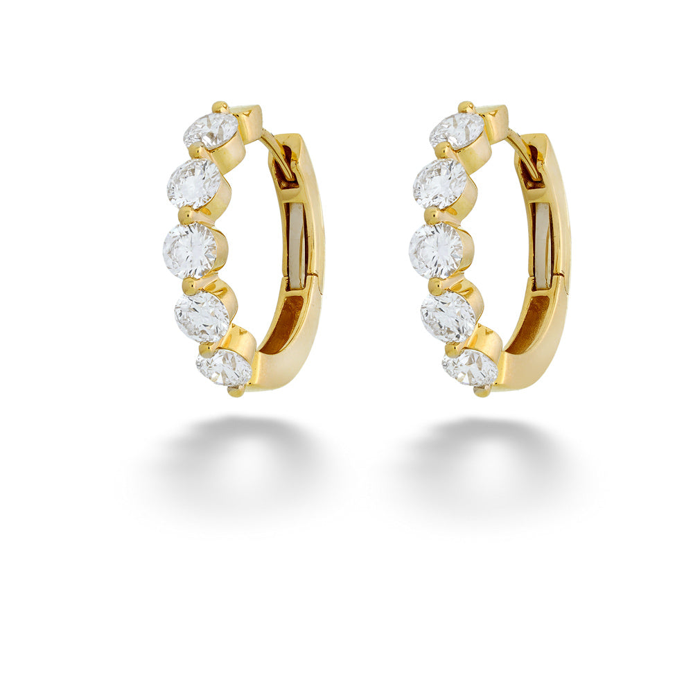 Gold hoop earrings with clear gemstones on a white background 18K Gold Diamond Hoops