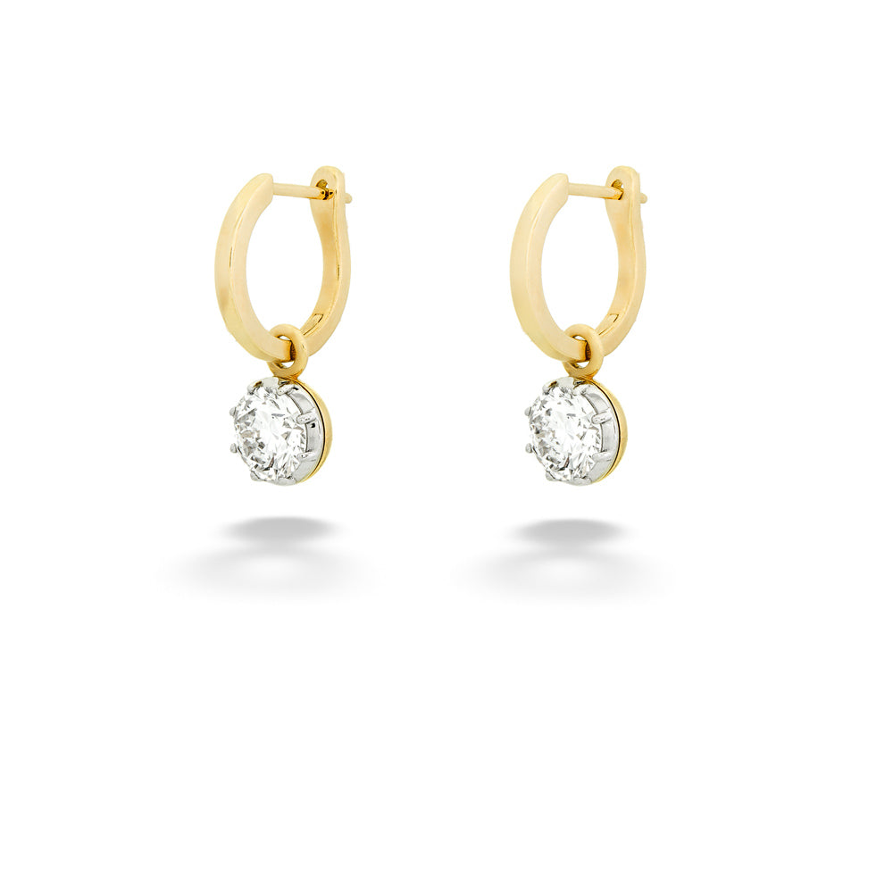 Gold hoop earrings with embedded diamonds on a white background Round Lab Grown Diamond Hoops by Miss Mimi