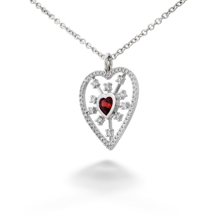 Heart-shaped pendant with a red gemstone on a white background Garnet Heart Pendant Necklace by Shy Creation