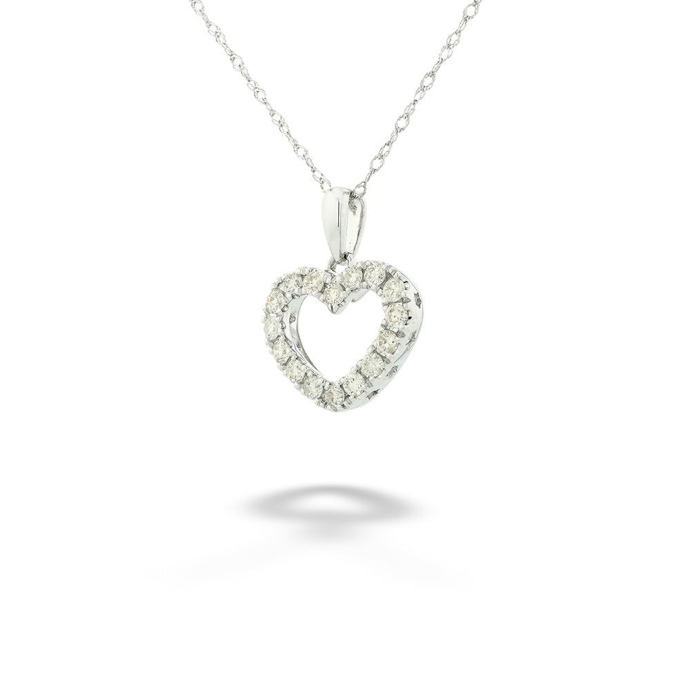Heart-shaped diamond pendant on a chain against a white background