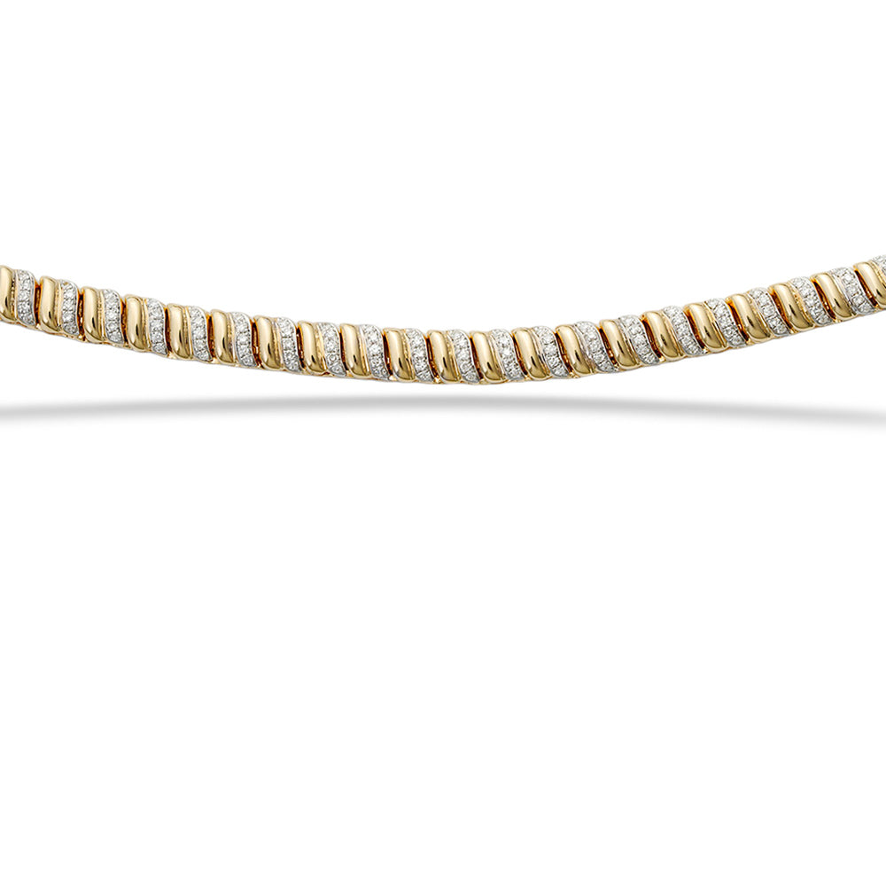 Gold and diamond bracelet on a white background  14K Gold Diamond Necklace by Shy Creation 