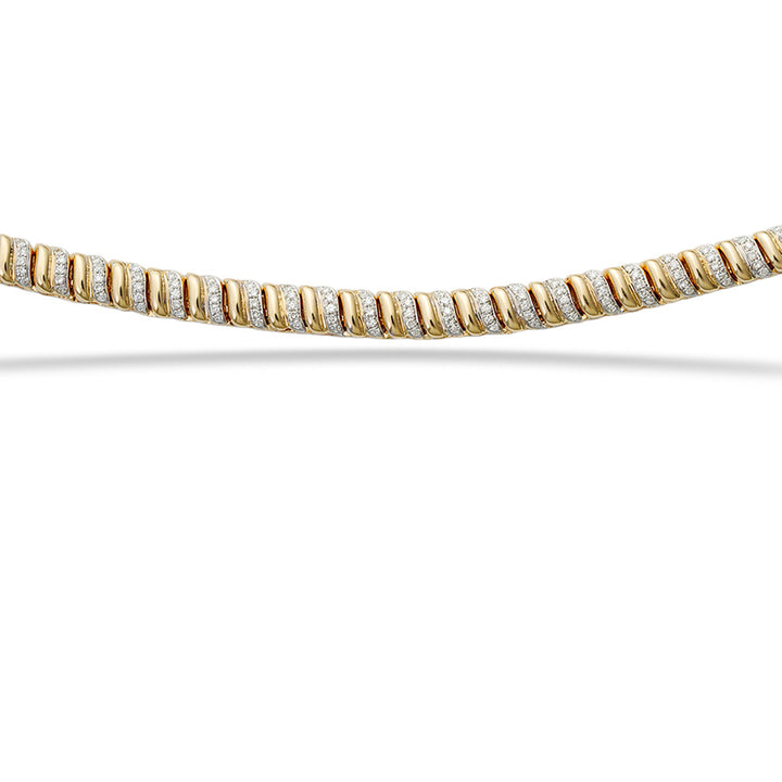 Gold and diamond bracelet on a white background  14K Gold Diamond Necklace by Shy Creation 