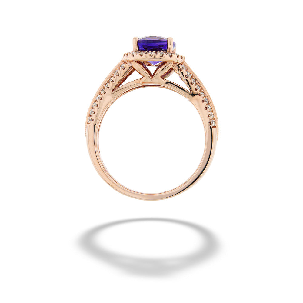 Rose gold ring with a purple gemstone on a white background 14K Rose Gold Amethyst Halo Ring
