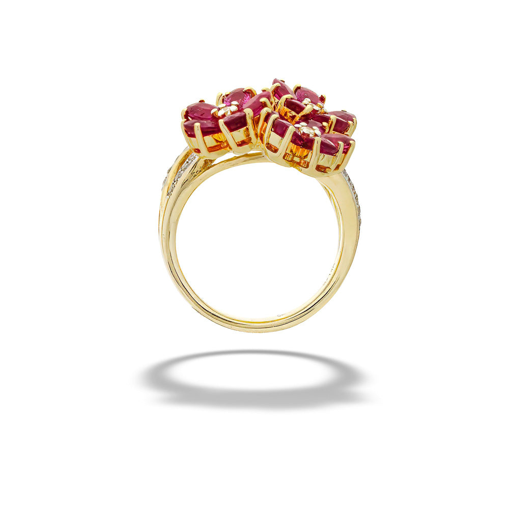 Gold ring with red gemstones on a white background  Ruby and Diamond Flower Ring 