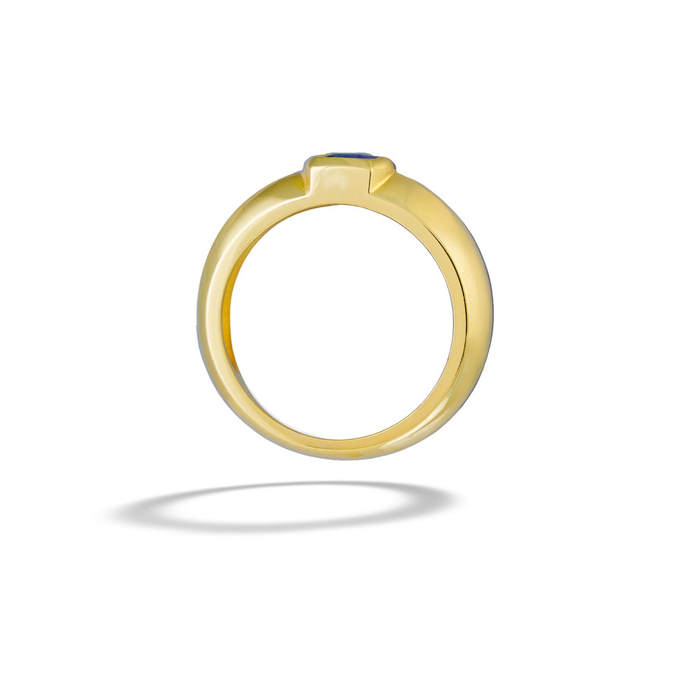 Gold ring with a blue gemstone on a white background 14K Gold Sapphire Ring by Mazza
