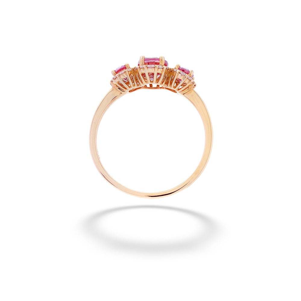 Rose gold ring with gemstones on a white background Lotus Garnet and Diamond 3-Stone Ring by Parle