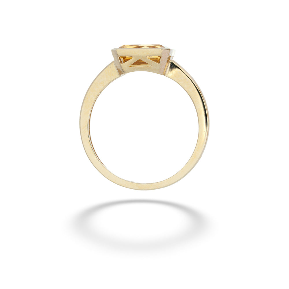 Gold ring with a central gemstone on a white background Citrine Ring by Shy Creation