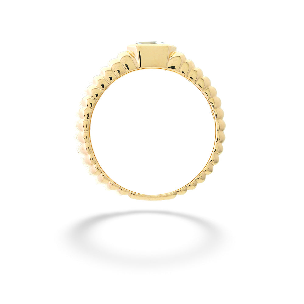 Gold ring with a textured band on a white background Aquamarine Ribbed Ring by Shy Creation