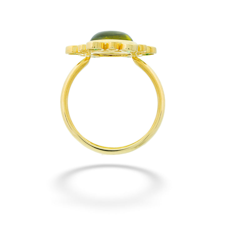 Gold ring with a green stone on a white background Peridot and Diamond Ring by Mazza