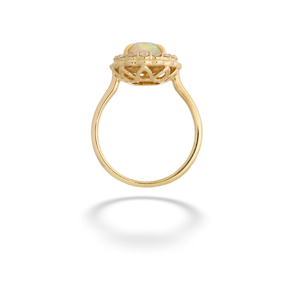 Gold ring with a green gemstone on a white background  14K Gold Opal Ring with Diamond Halo 