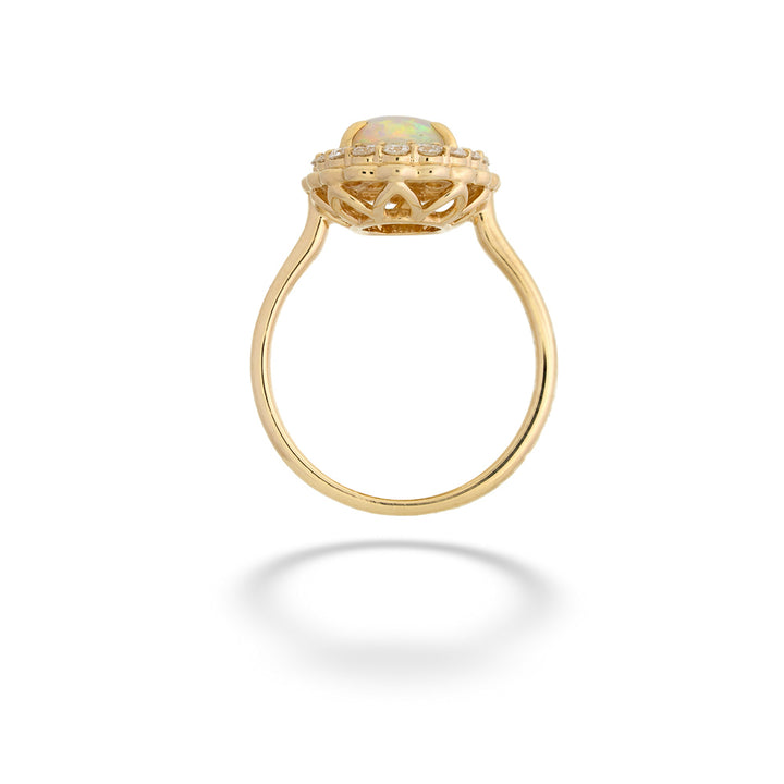 Gold ring with a green gemstone on a white background  14K Gold Opal Ring with Diamond Halo 