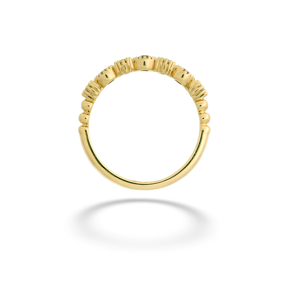 Gold ring with textured band on a white background Ruby and Diamond Ring