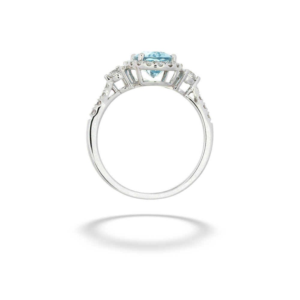 Silver ring with a blue gemstone on a white background Aquamarine and Diamond Ring 
