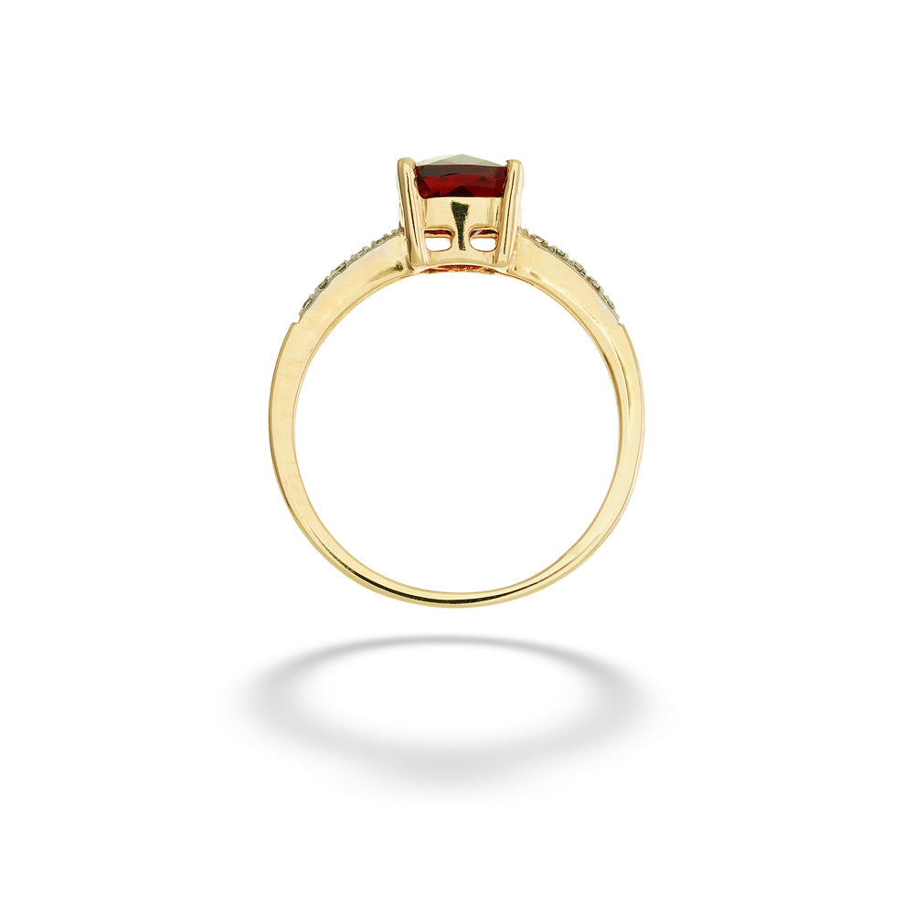 A gold ring with a rectangular red gemstone in a prong setting, shown from a top-down view on a white background with a soft shadow. Cushion-Cut Garnet and Diamond Ring 