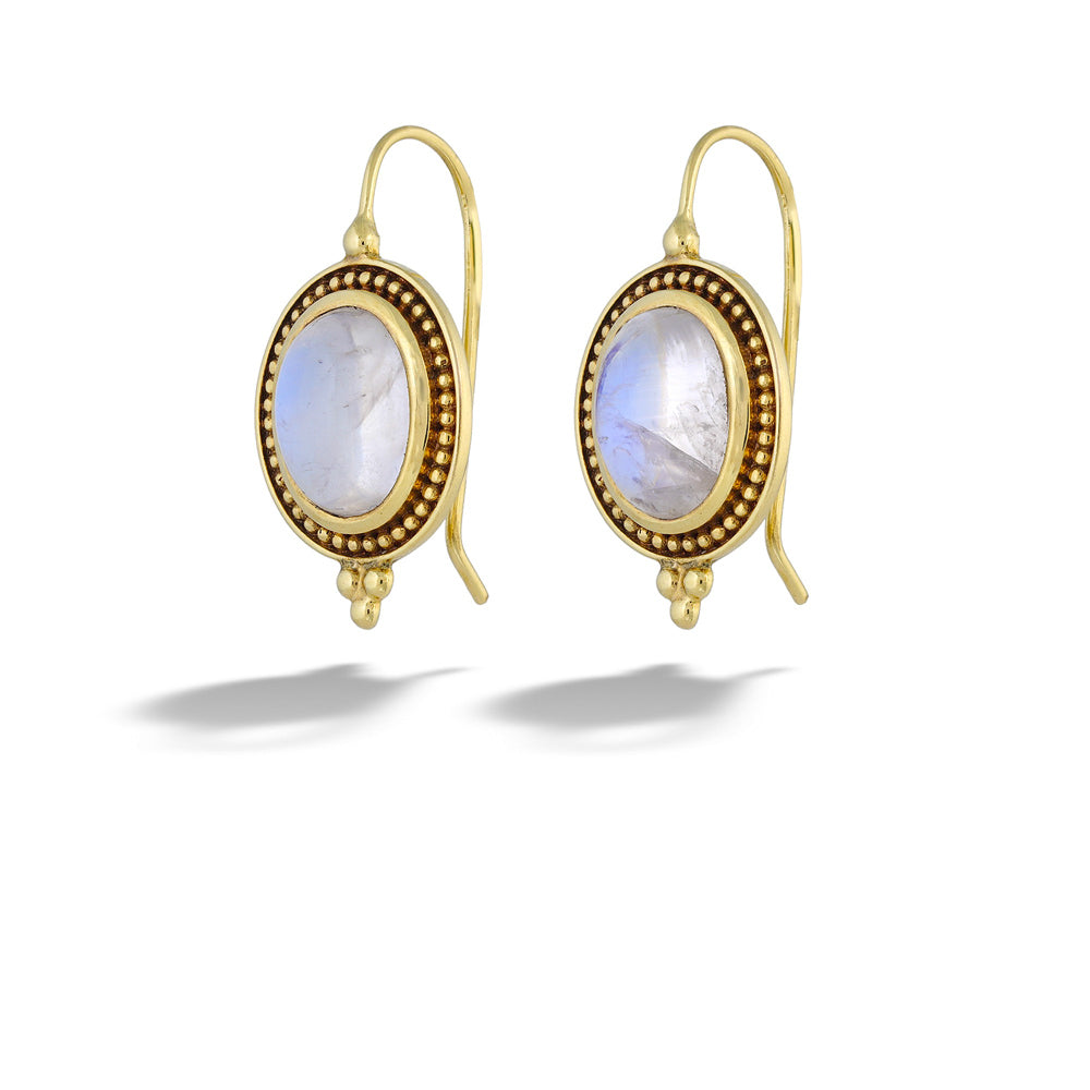 Gold earrings with moonstone stones on a white background  Moonstone Dangle Earrings by Mazza 