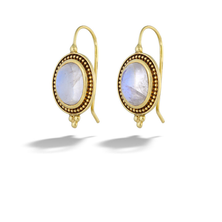 Gold earrings with moonstone stones on a white background  Moonstone Dangle Earrings by Mazza 
