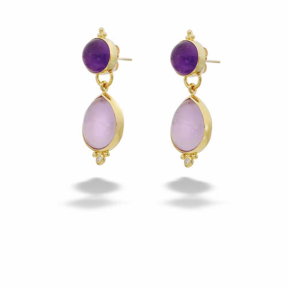 Pair of gold earrings with purple and pink stones on a white background Two-Tone Amethyst Dangle Earrings by Mazza