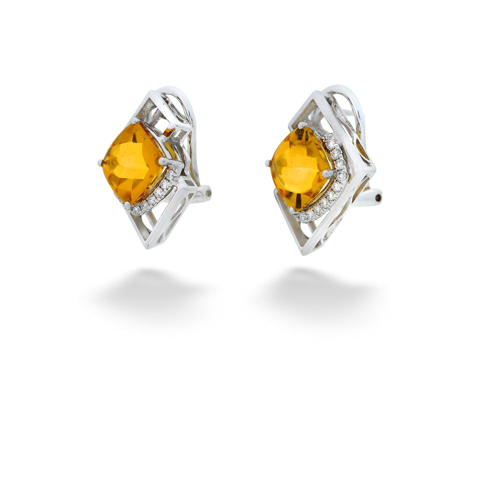 Pair of silver earrings with yellow gemstones on a white background Citrine and Diamond Geometric Earrings