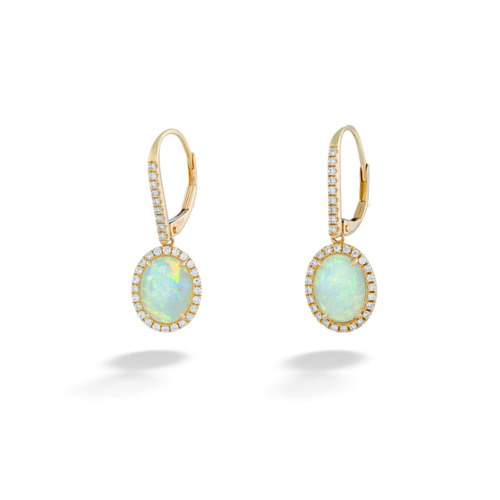 Gold earrings with opal stones on a white background Australian Opal and Diamond Halo Dangle Earrings