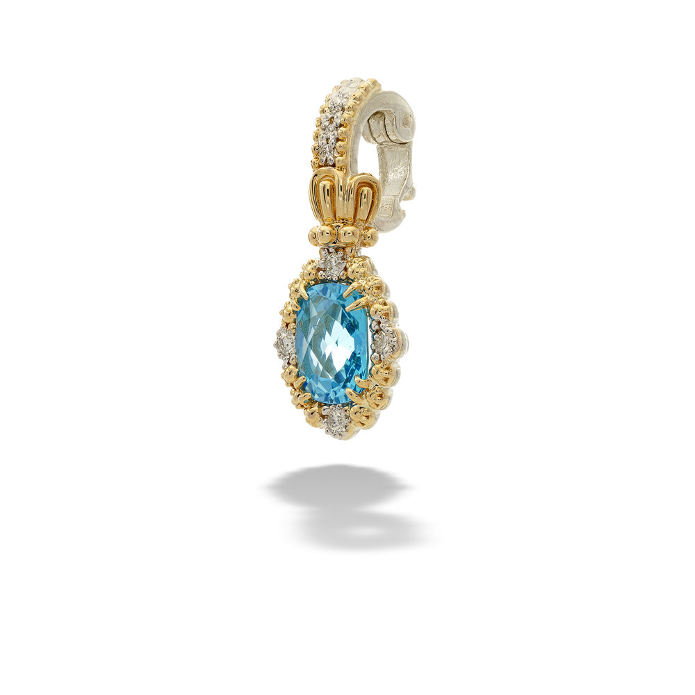 Gold pendant with a blue gemstone on a white background Blue Topaz and Diamond Pendant by Vahan