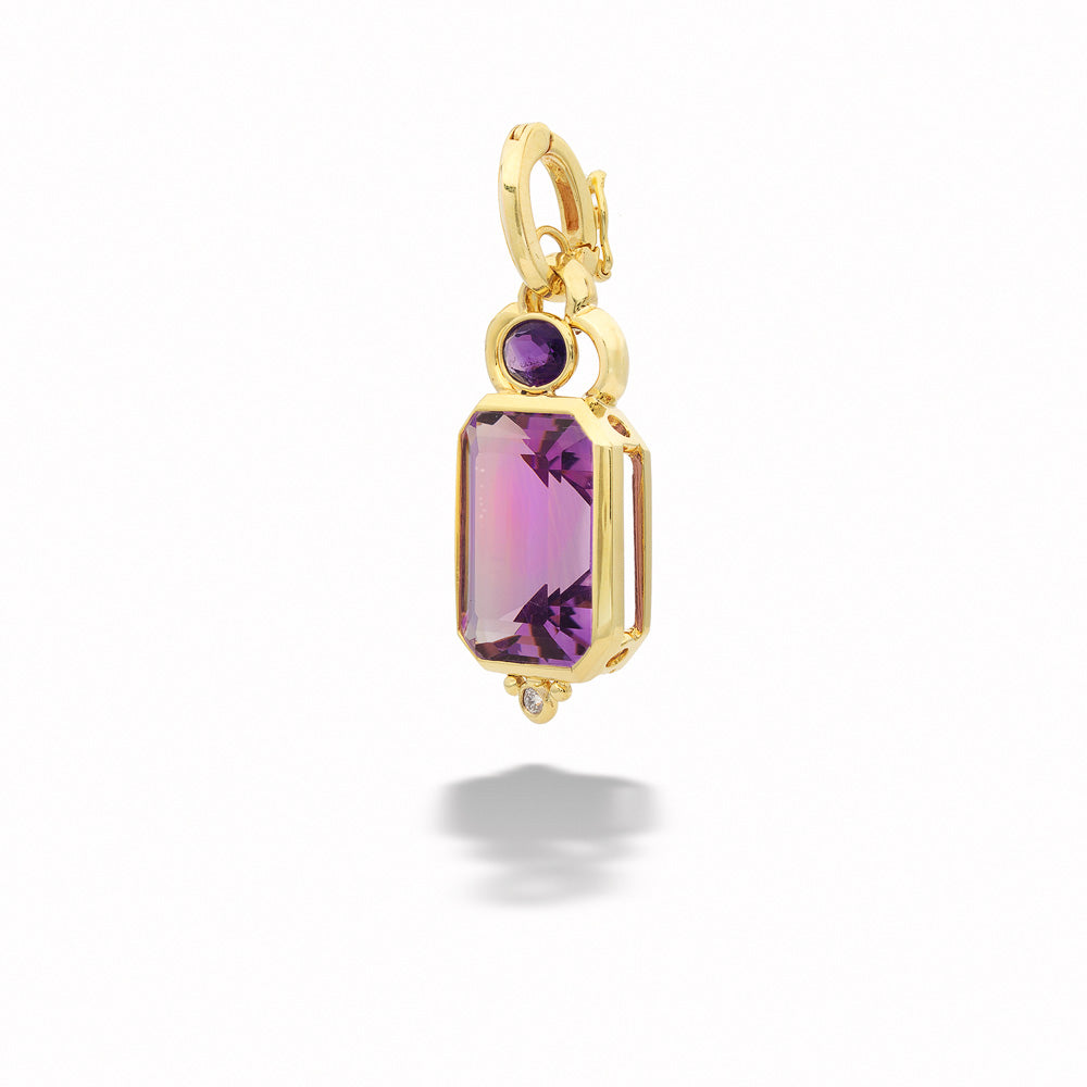 Gold pendant with a purple gemstone on a white background Amethyst and Diamond Pendant by Mazza