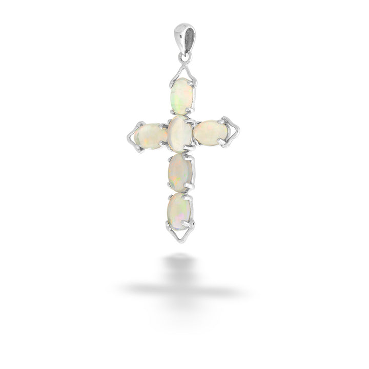 Opal cross pendant on a white background Opal Cross Pendant