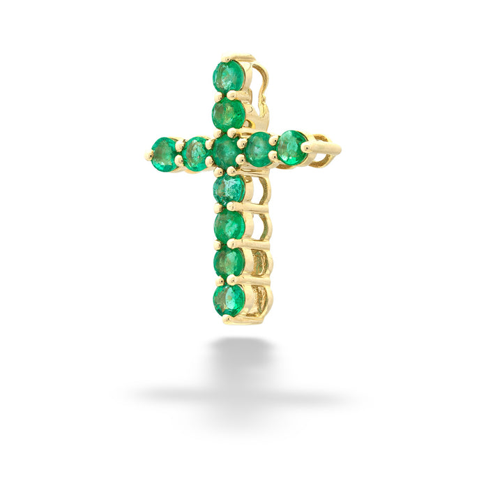 Gold cross pendant with green gemstones on a white background Emerald Cross Pendant