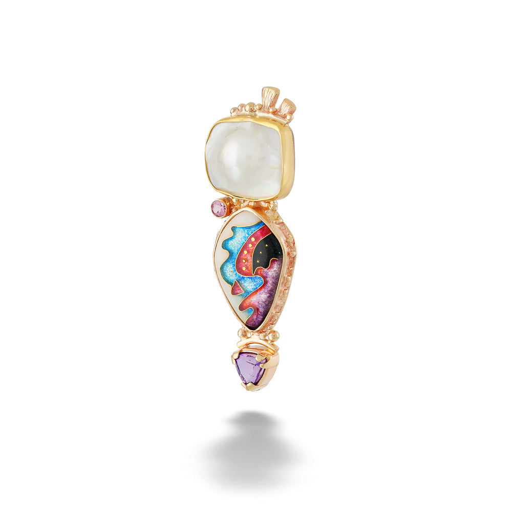 A gold pendant featuring a large white oval stone at the top, a teardrop-shaped center section with colorful abstract enameled details in blue, red, pink, and black, and a small purple heart-shaped stone at the bottom, shown on a white background. Abstract Moondance Pendant by Katrin Wolf