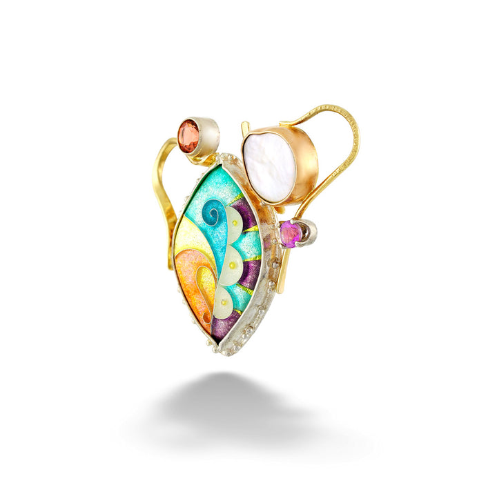 A gold and white gold ring featuring a colorful, hand-painted marquise-shaped enamel inlay with swirling patterns of teal, yellow, orange, and purple. The ring is accented with a white mother-of-pearl oval stone, a small pink gemstone, and a tiny round pink stone. Pastel Flow Enamel Enhancer by Katrin Wolf
