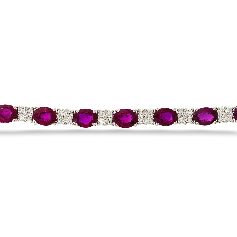 Bracelet with red gemstones and diamonds on a white background  Alternating Ruby and Diamond Bracelet 