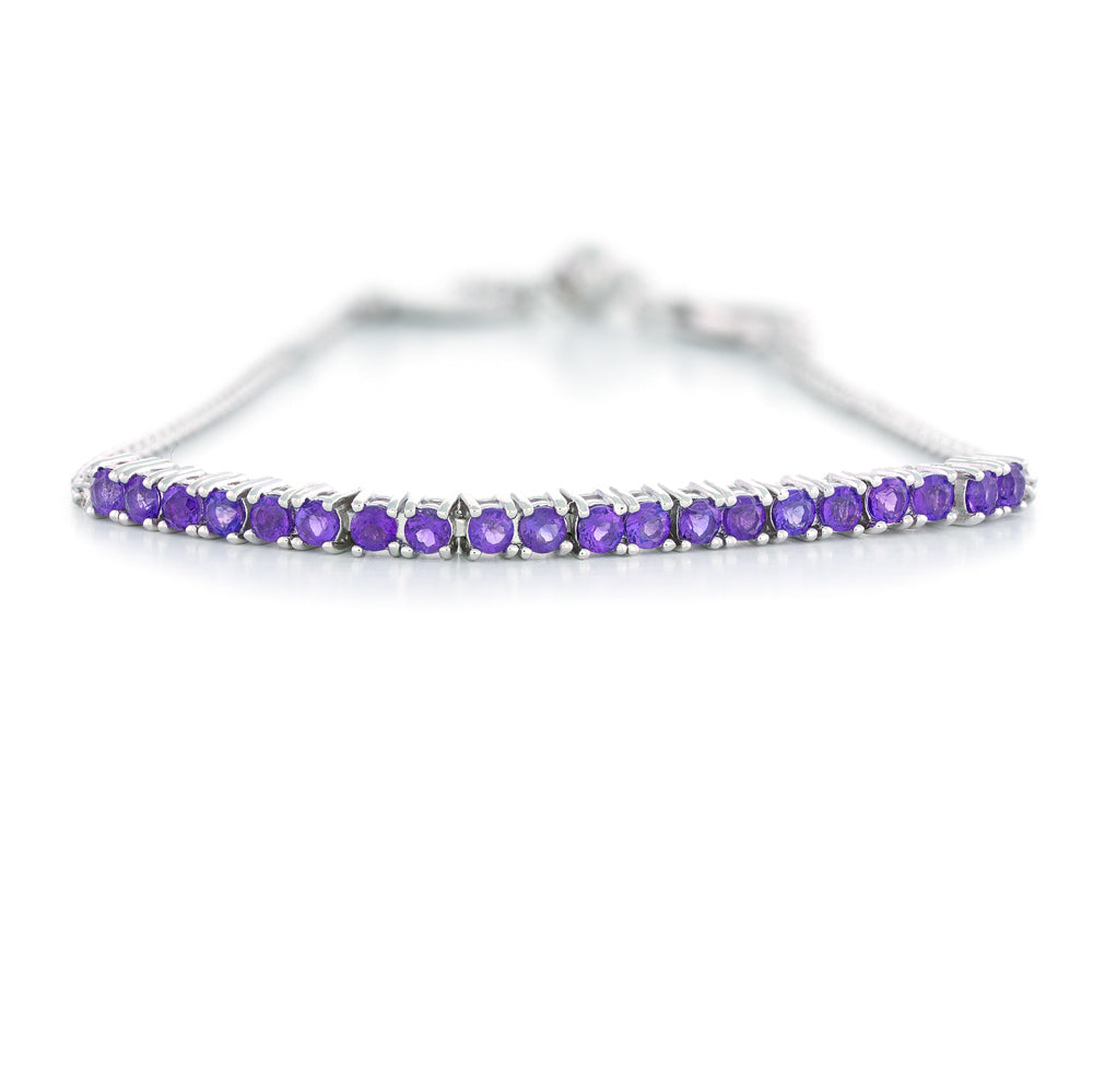 Silver bracelet with purple gemstones on a white background Adjustable African Amethyst Bar Bracelet by Samuel B.