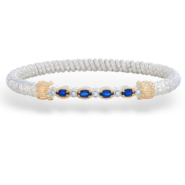 Bracelet with white rope design, gold accents, and blue gemstones on a white background Blue Sapphire and Diamond Bracelet by Vahan
