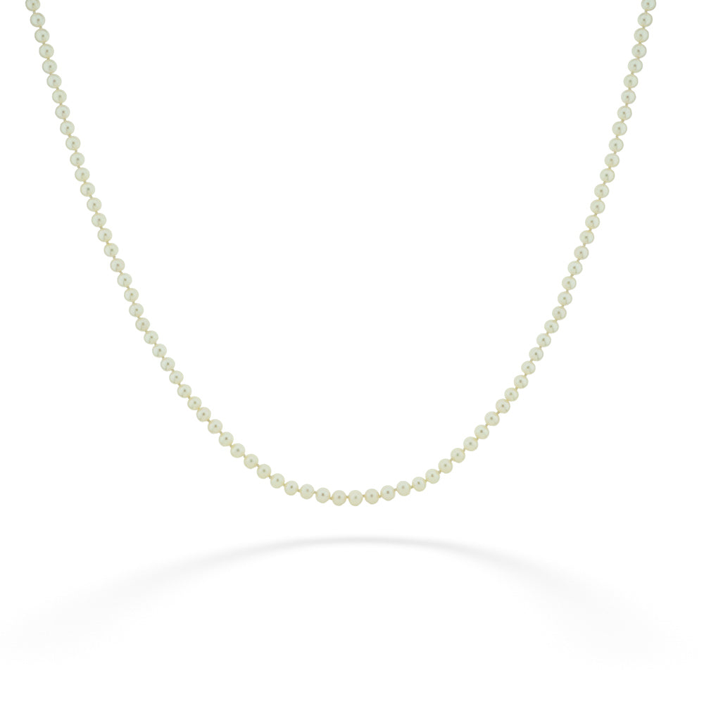 Strand of 5.5mm Cultured Akoya Pearls with "Corregated" Texture Pearl Clasp 25"