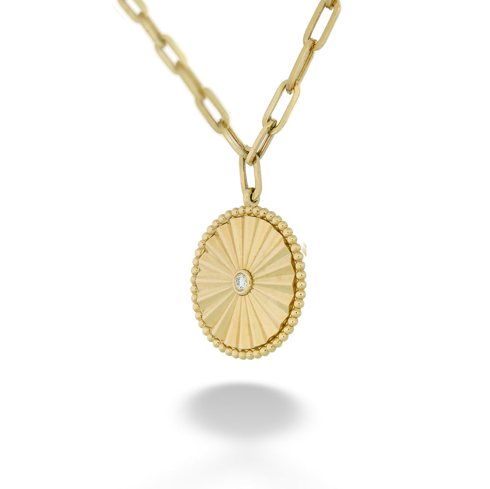 Gold necklace with a round pendant on a white background Radiant Diamond Medallion with Paperclip Chain by Gabriel &amp; Co.