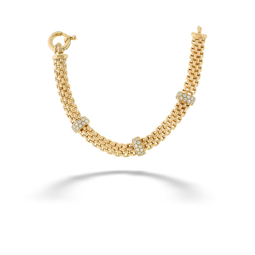 Gold chain necklace with embedded stones on a white background 3-Bar Oro Link Bracelet by Miss Mimi