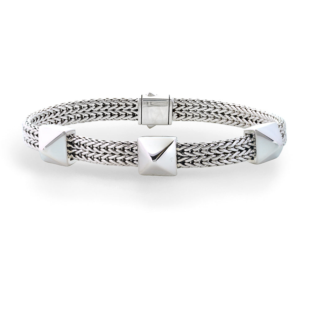 Silver bracelet with geometric design on a white background Icon Silver 3 Station Stud Wide Bracelet by John Hardy