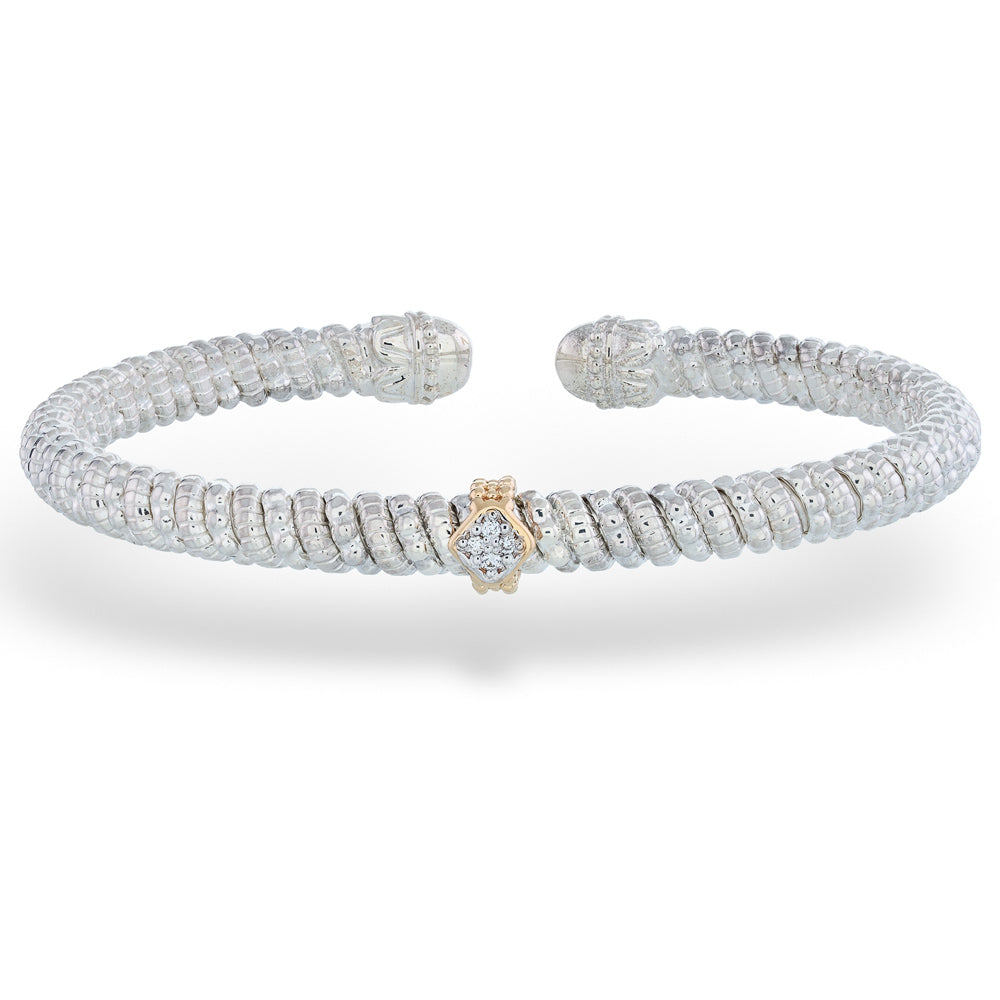Silver bracelet with a gold clasp on a white background Central Diamond Cuff Bracelet by Vahan