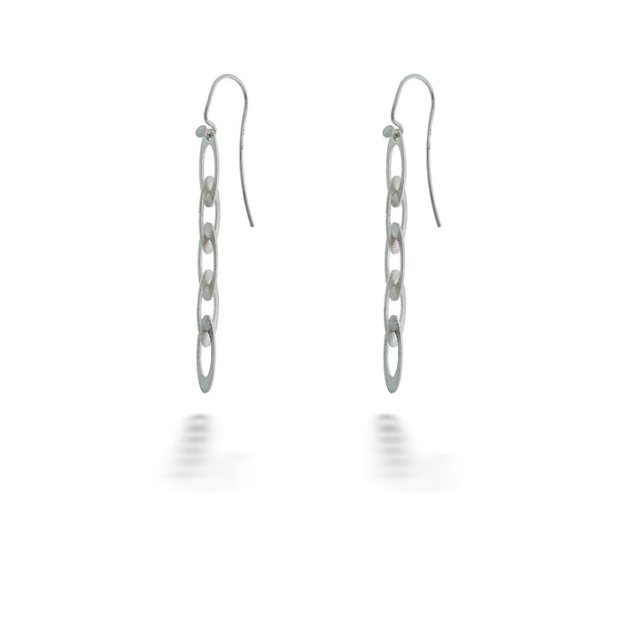 Pair of silver chain link earrings on a white background  Marquise Chain Earrings by Mysterium 