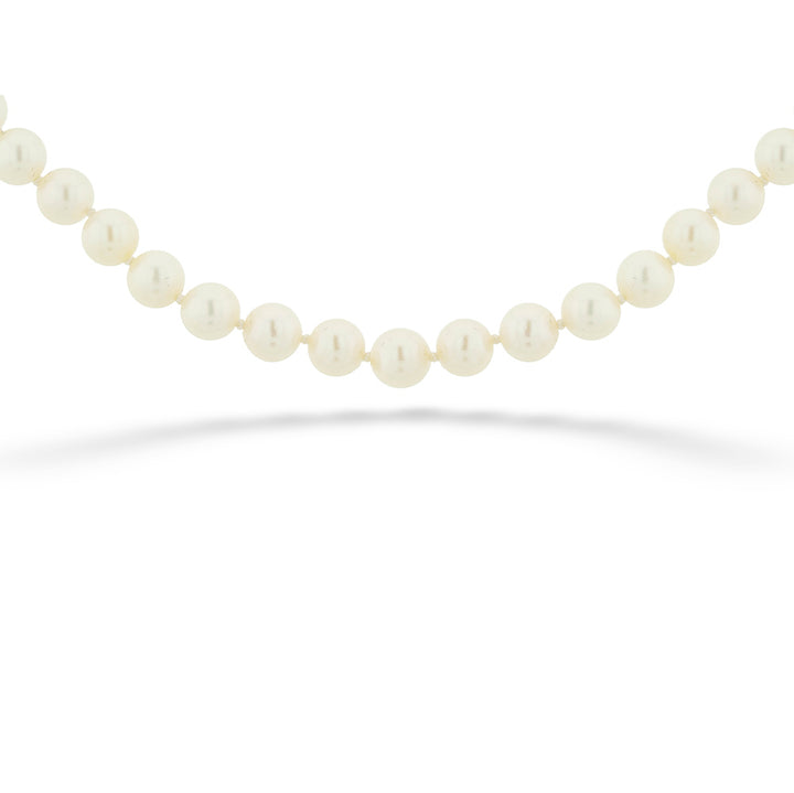 Strand of 5.5mm Cultured Akoya Pearls with "Corregated" Texture Pearl Clasp 25"