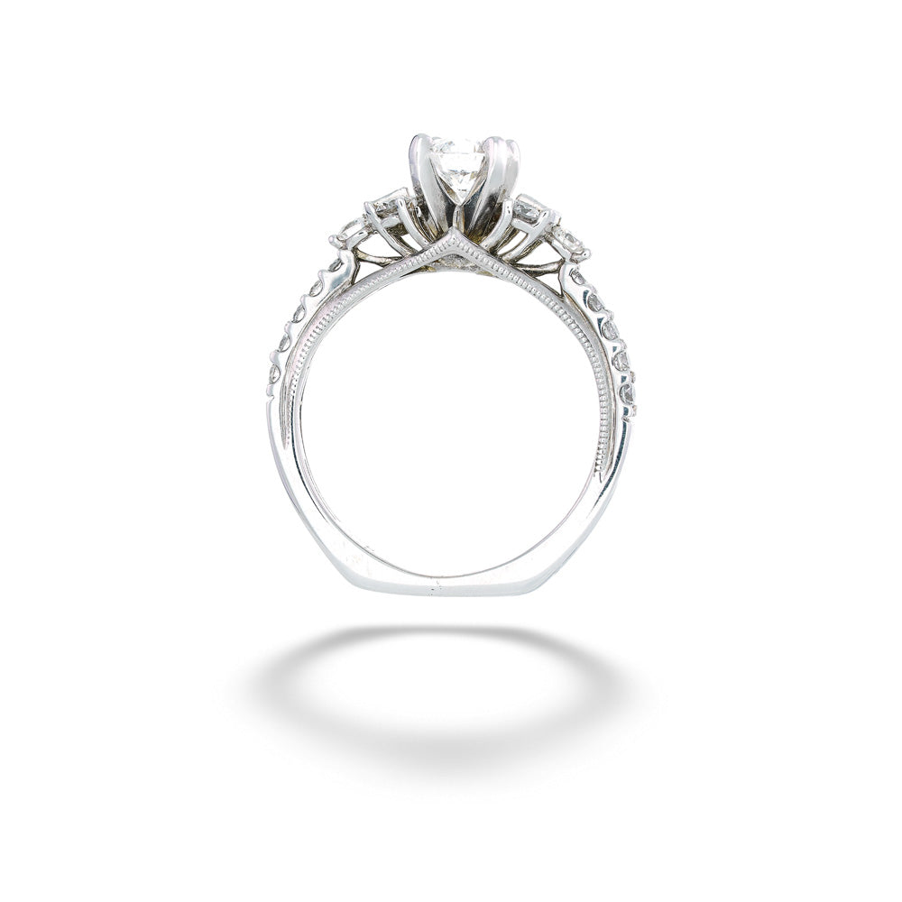Silver ring with intricate design on a white background 0.50ct Round Center Diamond and 0.40tdw Side Diamond Ring