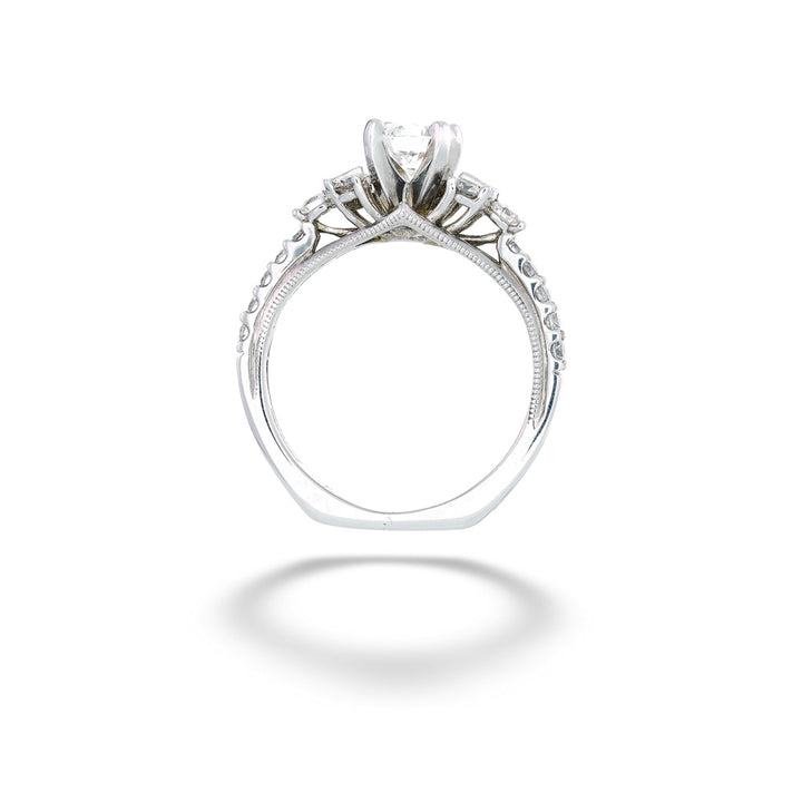 Silver ring with intricate design on a white background 0.50ct Round Center Diamond and 0.40tdw Side Diamond Ring