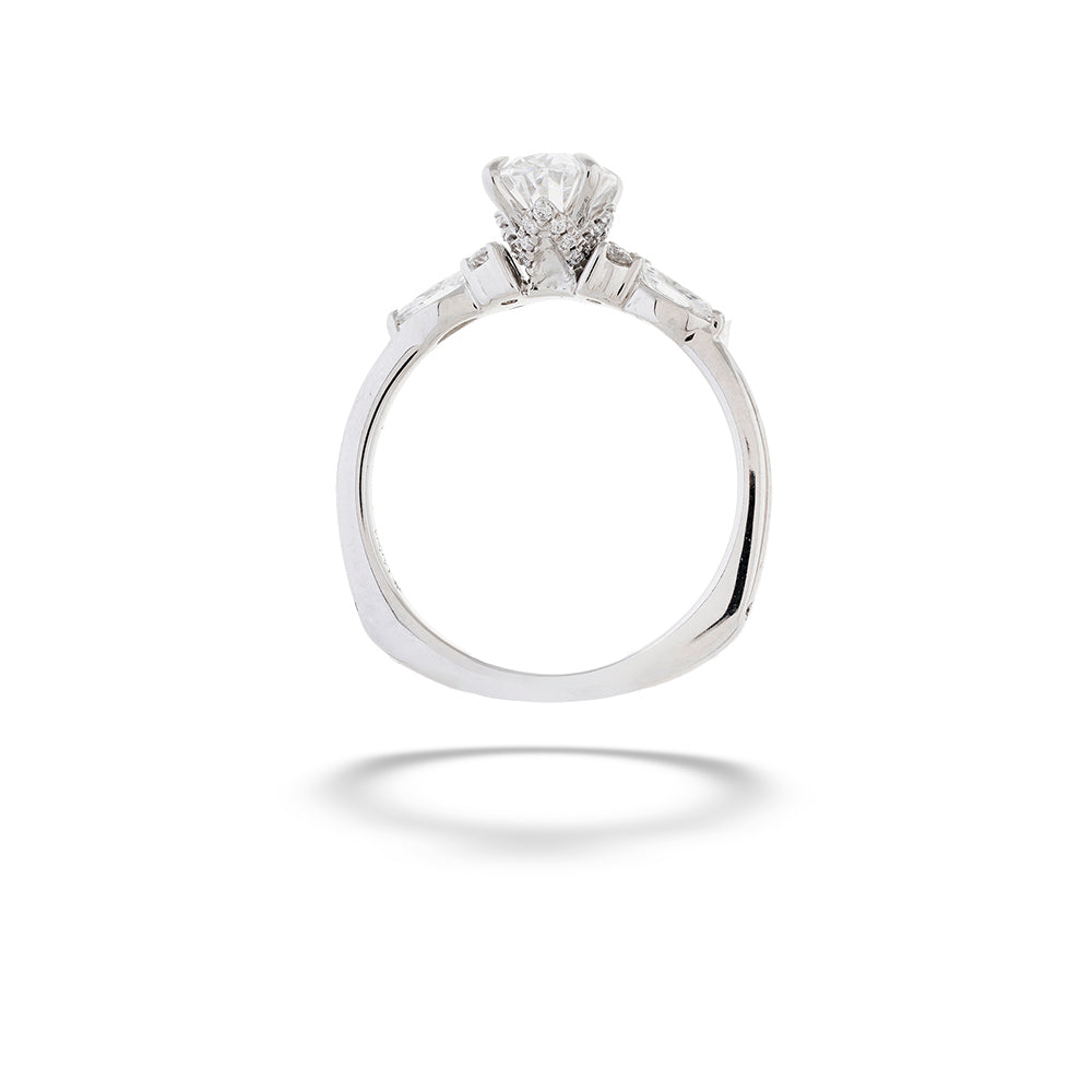 Diamond ring on a white background  Oval-cut Diamond Engagement Ring with Diamond Accents by Valina 