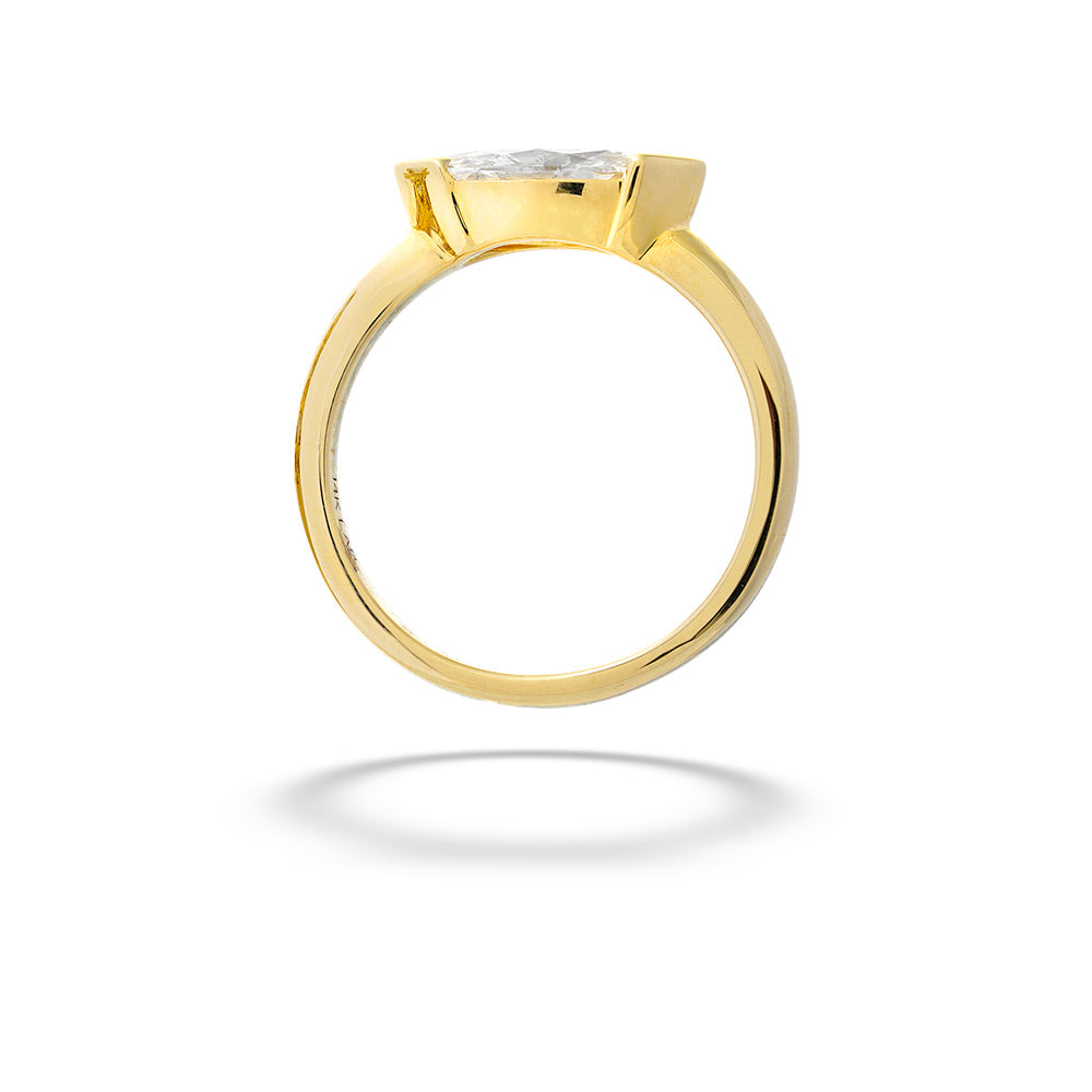 Gold ring with a diamond on a white background Marquise East to West Diamond Engagement Ring by Valina