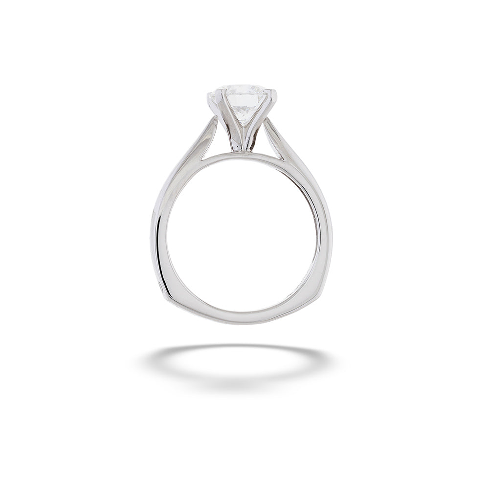Silver ring with a diamond on a white background 14K White Gold Solitaire Round Diamond Engagement Ring by Valina 