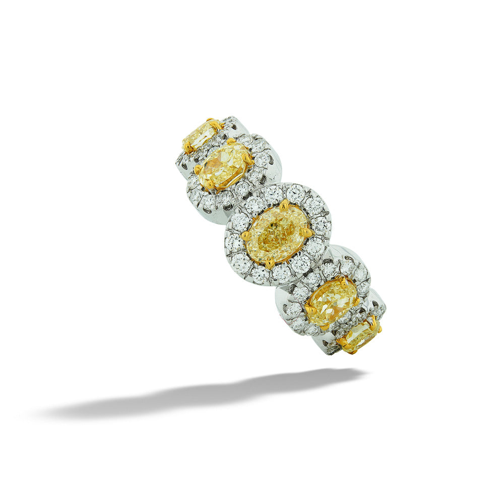 Natural Yellow and White Diamond Oval Halo Ring